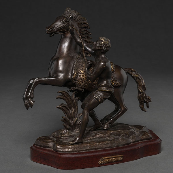 "Caballo y Jinete" Grupo escultórico realizado en bronce pavonado y dorado del siglo XX