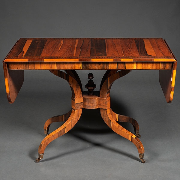 Sofá Table en madera de raíz de nogal y palosanto época Regencia h. 1835-1840.