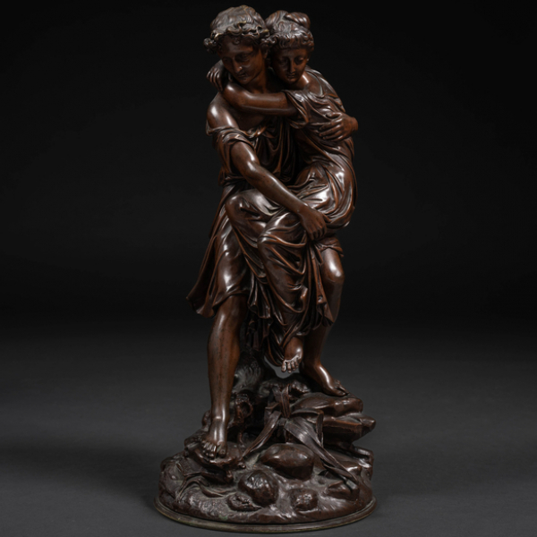 "Joven sujetando a una dama para cruzar el río" Escultura en bronce con patina marrón.