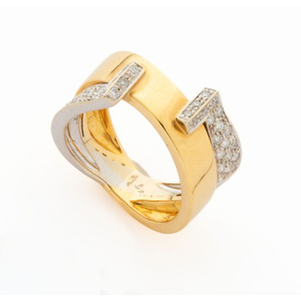 Sortija en oro amarillo y oro blanco con 2 cuajados de diamantes talla brillante con un peso total de 0,90 cts.