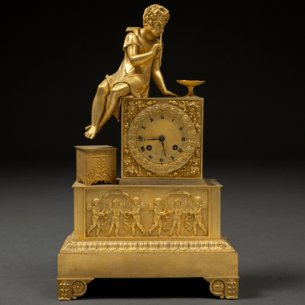&quot;Flautista&quot; Reloj de sobremesa francés en bronce dorado del siglo XIX.