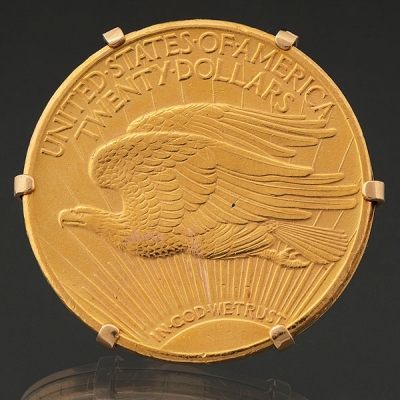 Broche o Colgante en oro amarillo de 18kt con moneda en su interior de 20 dolares americanos.