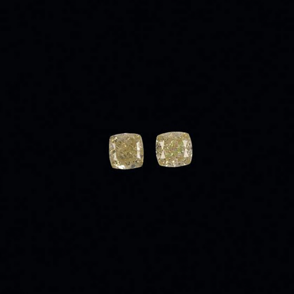 Dos diamantes fancy yellow 1,50 cts cada piedra