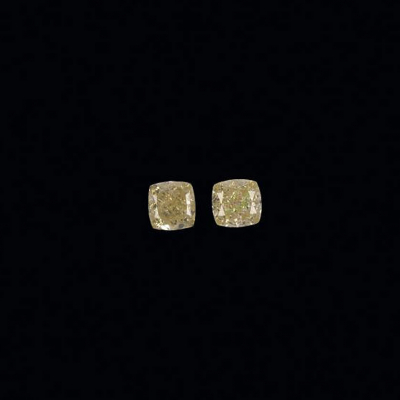 Dos diamantes fancy yellow 1,50 cts cada piedra