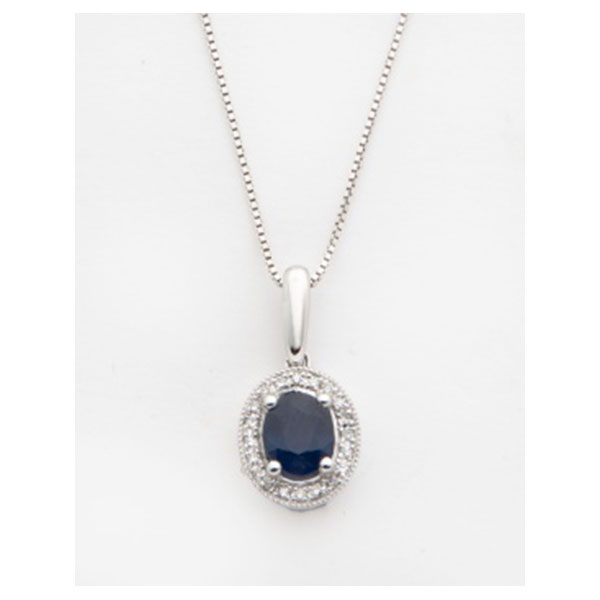 Cadena y colgante en oro blanco con zafiro azul central y cuajado de diamantes talla brillante alrededor con un peso total de 0,04 cts. aprox.