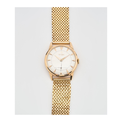 OMEGA. Reloj de pulsera para caballero. En oro, c.1950. Esfera satinada con numeración a trazos aplicados.