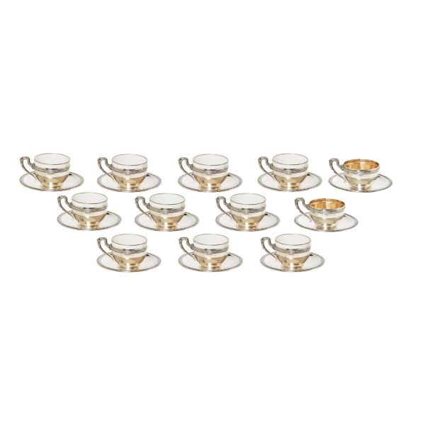 Lote de doce tazas con platos en plata española y porcelana alemana Felda-Rhön, c.1935-1945.