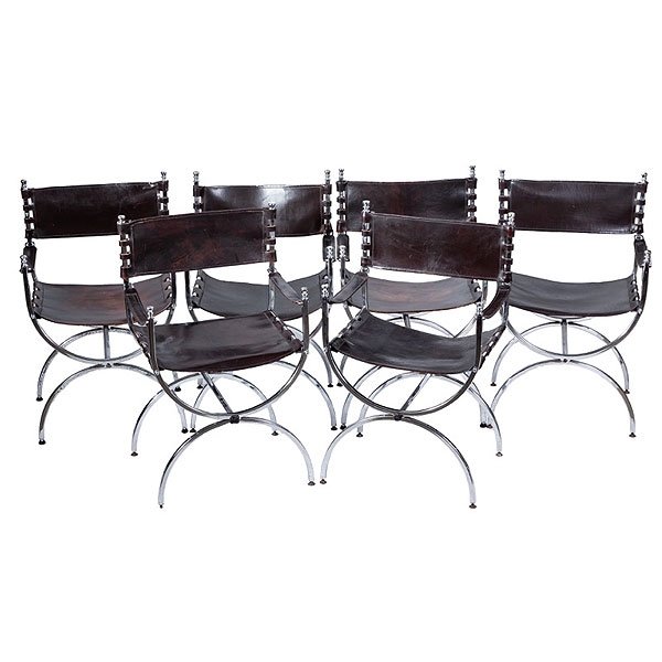 Seis sillas de brazos cromadas con asiento y respaldo de cuero, trabajo francés diseño del S.XX. 