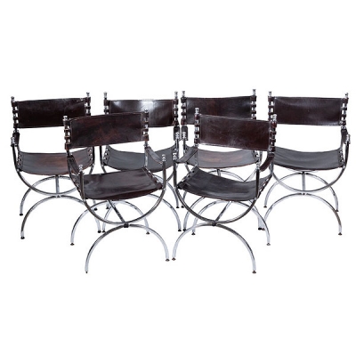Seis sillas de brazos cromadas con asiento y respaldo de cuero, trabajo francés diseño del S.XX. 