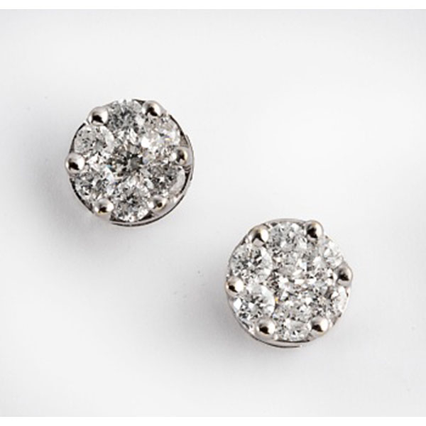 Pendientes en oro blanco con diamantes talla brillante formando una flor con un peso total de 1 cts. aprox.