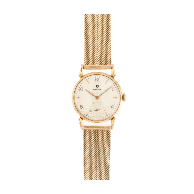Reloj Omega de pulsera para caballero. En oro, c.1950. Esfera satinada con numeración arábiga y a trazos aplicados.