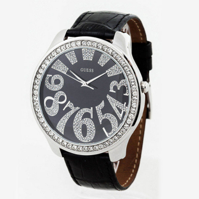 Reloj unisex GUESS ref G85850L, en gran caja circular (51 mm.) de acero con orla de cristales, y pulsera de piel negra.