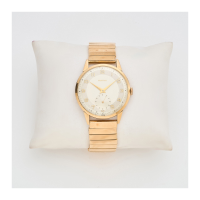 ZENITH. Reloj de pulsera para caballero. En oro, c.1950. Esfera en tonalidades marfil con numeración arábiga.