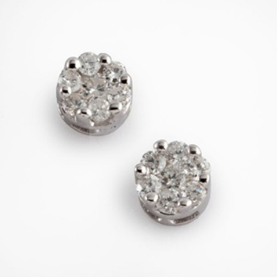 Pendientes en oro blanco con diamantes talla brillante formando una flor con un peso total de 0,84 cts. aprox.
