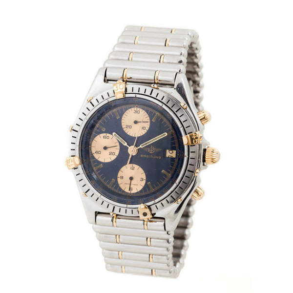 Reloj cron&oacute;grafo suizo BREITLING Chronomat, en caja 38 mm, ref. 81.950, n&ordm; 66440 con numerales de oro amarillo 18 K, y brazalete Rouleaux 