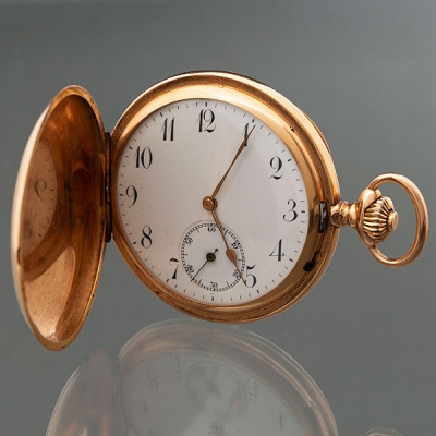 Reloj de bolsillo con tapa en oro rosa de 18 kt.