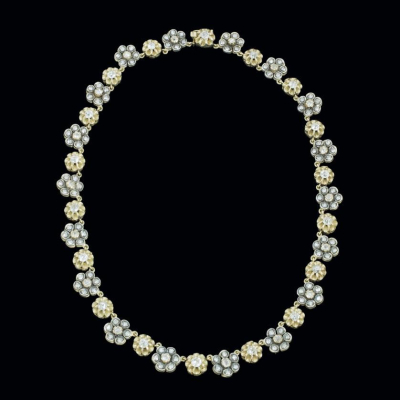 Collar de oro 14 K y plata flores con diamantes. 