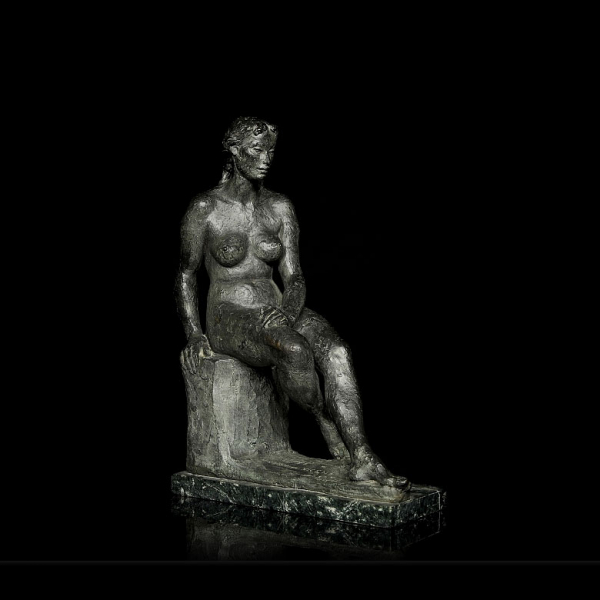 Octavio Vicent (1914-1999) "Mujer sentada".    Escultura de bronce sobre peana de mármol.
