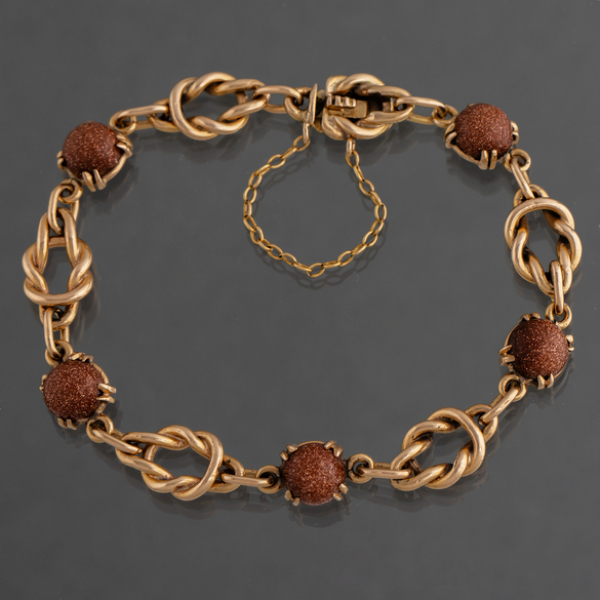 Pulsera de eslabones en oro amarillo de 18 kt con piedras de venturina.