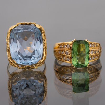 Conjunto de dos anillos en oro amarillo de 18kt con topacios y brillantes.