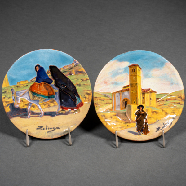"Segoviano con Iglesia y Segovianos con burro" Conjunto de dos platos de la serie regionalista en cerámica de Daniel Zuloaga.