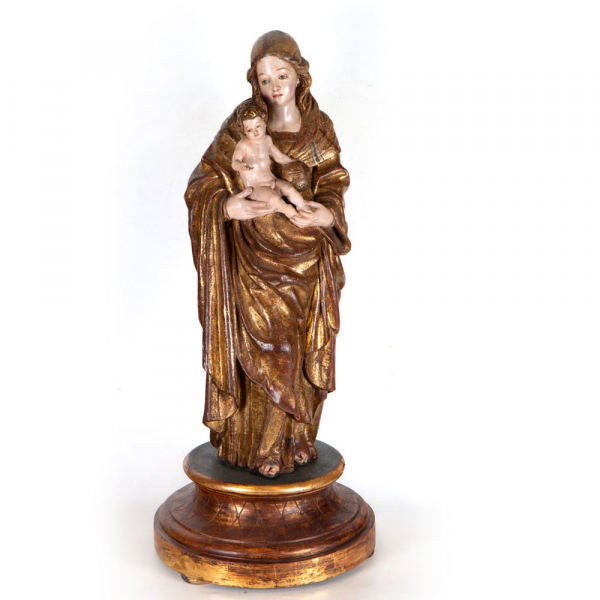 Virgen con Niño, escuela Hispano Flamenca del siglo XVI.    En madera tallada, con restos de policromía dorada original