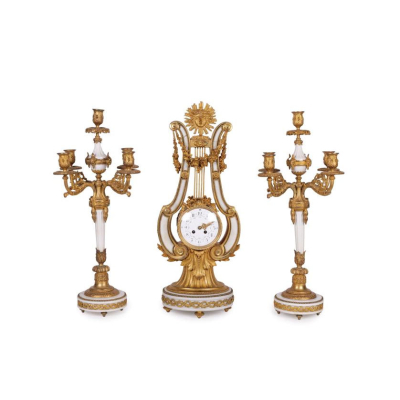 Reloj y guarnici&oacute;n de estilo Luis XVI Napole&oacute;n III S. XIX.   