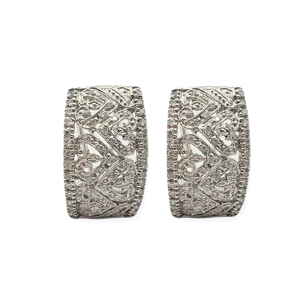 Pendientes en oro blanco de 18k de corazones de diamantes talla brillante.