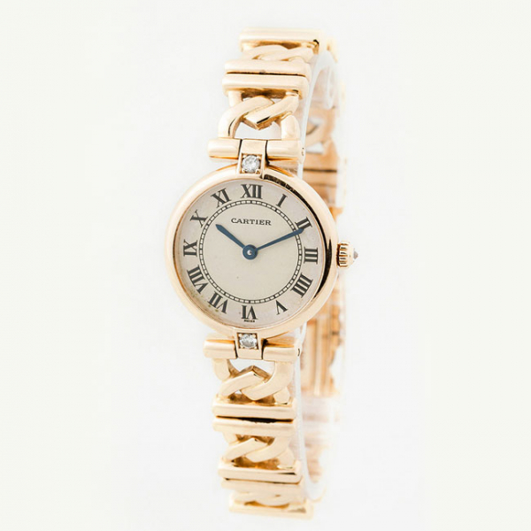Reloj sra., suizo, CARTIER Vend&ocirc;me, ref. 1068 decorada con un limpio y blanco diamante y oro amarillo 18 K.