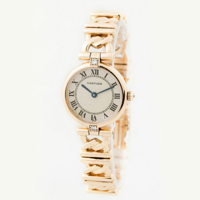 Reloj sra., suizo, CARTIER Vend&ocirc;me, ref. 1068 decorada con un limpio y blanco diamante y oro amarillo 18 K.