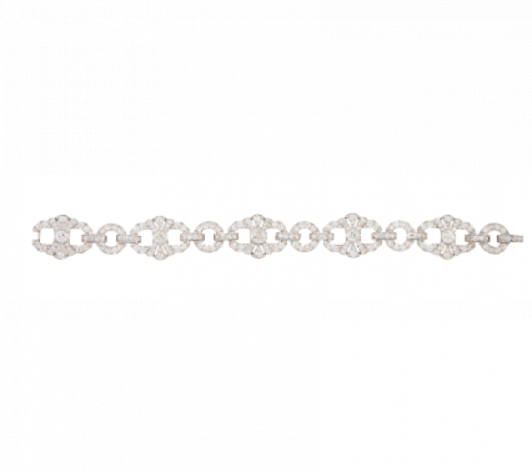 Brazalete Art-Decó de brillantes de talla antigua, con diseño de cinco piezas lobuladas articuladas con aros.   En oro blanco de 18 K.