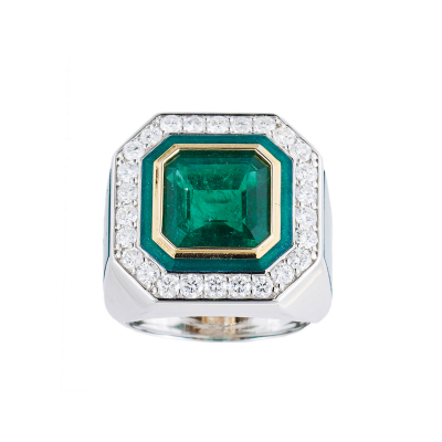 Sortija sello en oro blanco con esmeralda de Zambia talla octogonal orlada por diamantes talla brillante, brazo y orla central en esmalte verde.