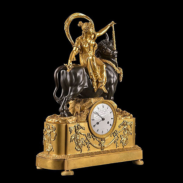 Reloj de bronce dorado con escena de el rapto de Europa, Francia, siglo XIX