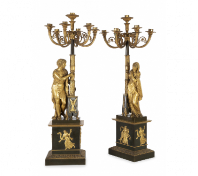 Pareja de candelabros Imperio de siete brazos de luz, de bronce patinado y bronce dorado.  Atribuidos a Pierre-Philippe Thomire (1751-1843).  Francia, pp. del S. XIX. 