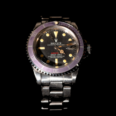 ROLEX mod. Oyster Perpetual Date Submariner &quot;Purple Bezel&quot;, Superlative Chronometer Officially Certified. Ref. 1680. 