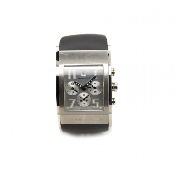 JORG HYSEK. Reloj de pulsera para caballero. En acero y correa de caucho.  