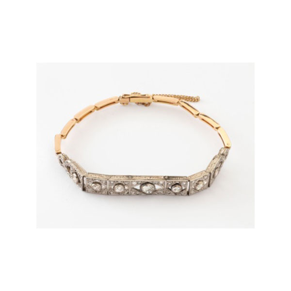 Pulsera antigua Época Art Deco en oro amarillo y oro blanco con 7 diamantes talla brillante centrales y diamante  