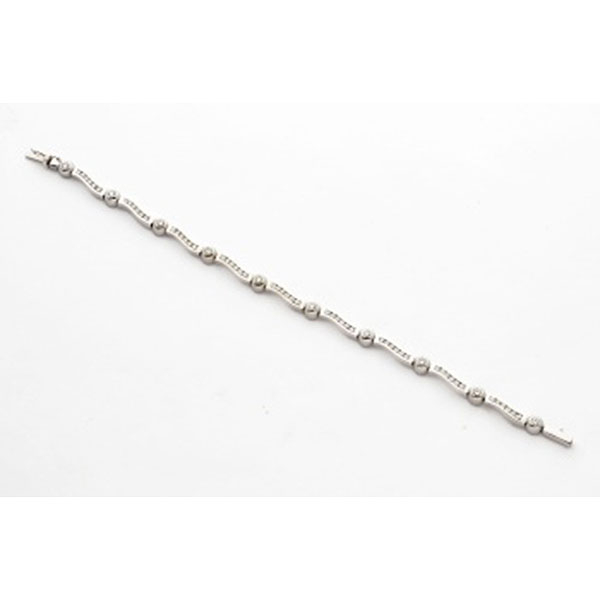 Pulsera riviere en oro blanco con 10 diamantes talla brillante unidos por fila de diamantes talla brillante