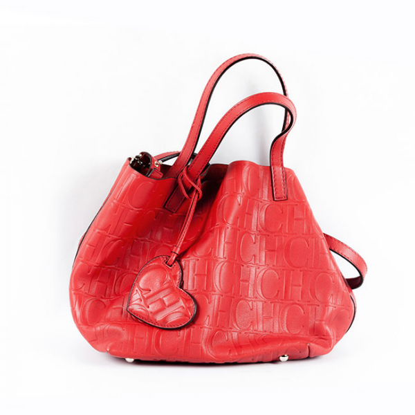 Bolso de la firma CAROLINA HERRERA, moedelo Matryoshka S, elaborado en piel roja Baobab 
