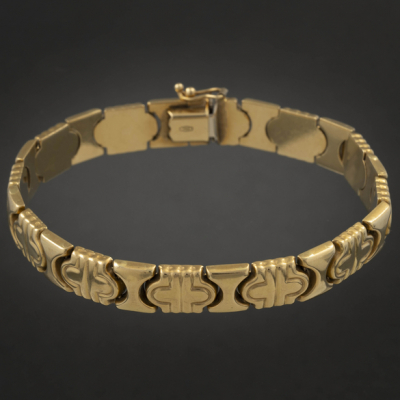 Pulsera articulada de eslabones geométricos en oro amarillo de 18 kt