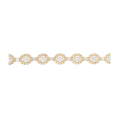 Pulsera en oro con rosetones de zircón talla oval orlado por diamantes talla brillante y alternados por diamantes talla princesa.