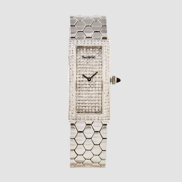 BARTHELAY. Reloj de pulsera para señora. En acero. Esfera y bisel cuajados de diamantes talla brillante. Mecanismo de quartz.