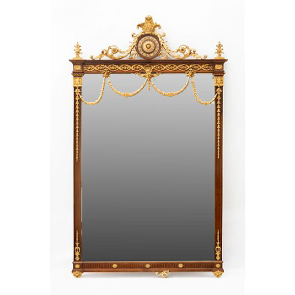 Espejo en madera tallada y dorada Estilo Luis XVI.