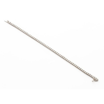 Pulsera riviere en oro blanco con 60 diamantes talla brillante con un peso total de 3,05 cts. aprox.