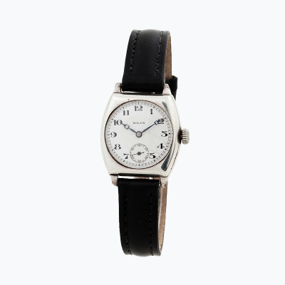 Reloj ROLEX vintage en caja de plata y piel negra. C1935.