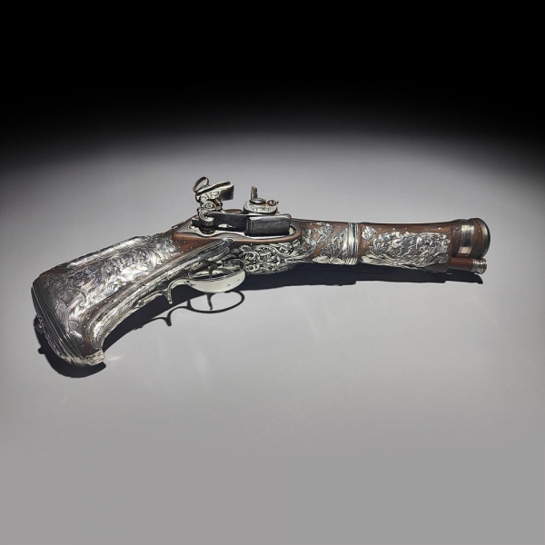 Pistola Trabuco de cinturón Miquelet - Lock ornada en plata mexicana, Nueva España, siglo XVIII.