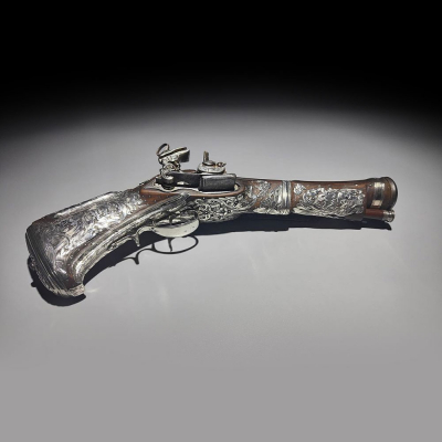 Pistola Trabuco de cinturón Miquelet - Lock ornada en plata mexicana, Nueva España, siglo XVIII.
