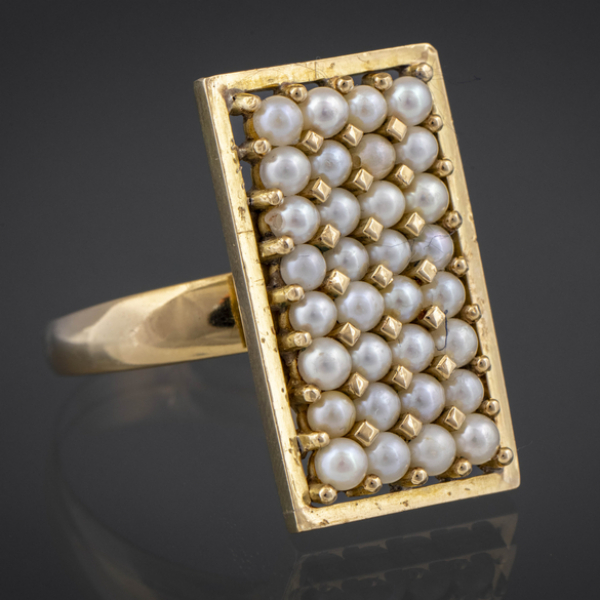 Anillo en oro amarillo de 18kt con perlitas cultivadas.