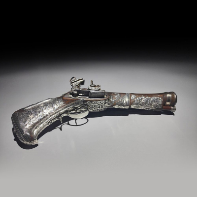 Pistola Trabuco de cinturón Miquelet - Lock ornada en plata mexicana, Nueva España, siglo XVIII.