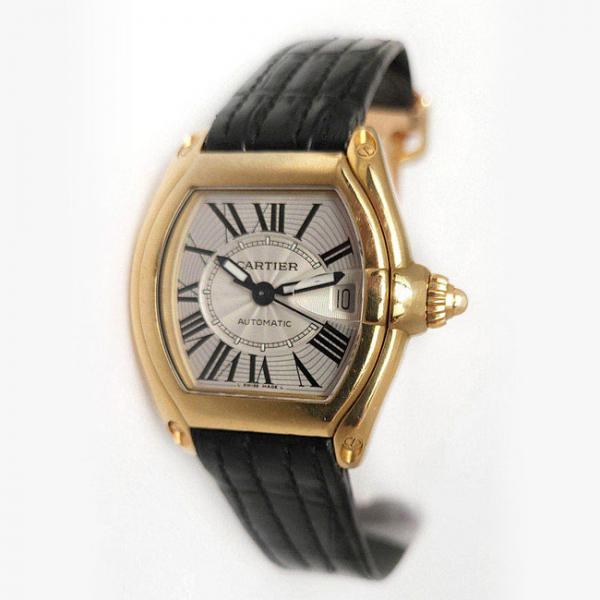Reloj cab. suizo, CARTIER Roadster, ref 2524. Sólida caja barrilete en oro amarillo 18 K, 34 x 38 mm.